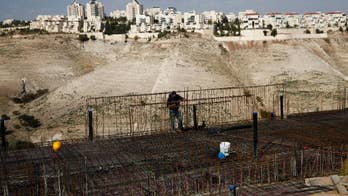 The Latest: Israel delays vote on settlement annexation