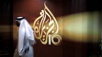 Al-Jazeera says Egypt holds producer on 'fabricated charges'