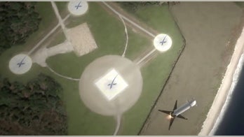 SpaceX may try land-based rocket landing this month, NASA official says