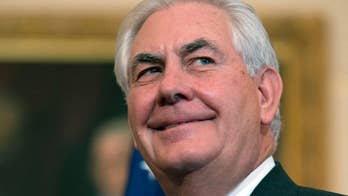 Trump's secretary of state faces questions on first trip