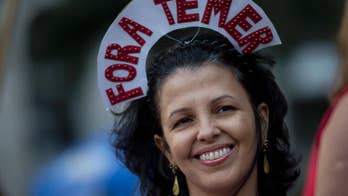 Brazil's Carnival revelers channel anger against president