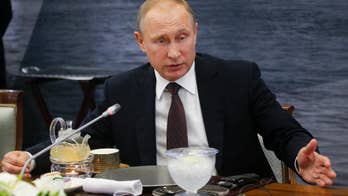 Putin condemns Russian athletes ban at Rio as unfair
