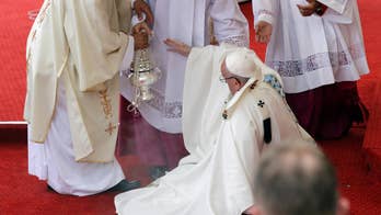 Pope: I fell because I forgot there was step at altar's edge