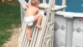 Child scales 'un-climbable' pool ladder in viral video