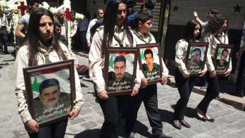 The Latest: France links sarin gas used in Syria to regime