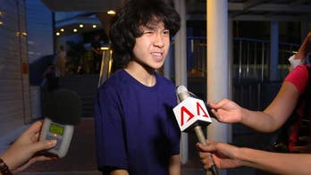 Singapore teen critic held in US while appealing for asylum