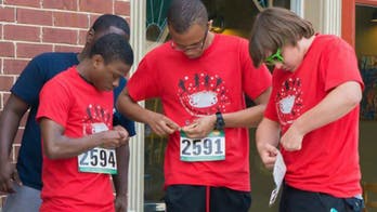 In Ferguson, running bridges the races
