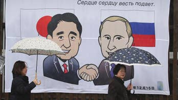 Russian leader Putin heading to Japan for territorial talks