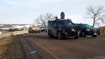 Police begin making arrests in pipeline protest camp