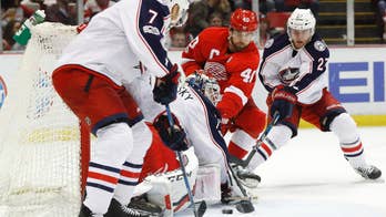Jones scores in OT to lift Blue Jackets over Red Wings