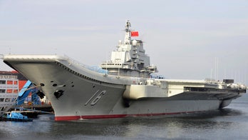 China's first aircraft carrier sets off for Western Pacific