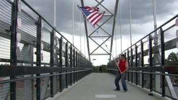 Memorial Day: Man spends 6 hours waving American flag over highways