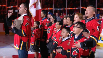 The Calgary Flames invited 10 new Canadian citizens to sing national anthem before game