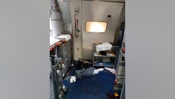 Flight attendant on Delta flight broke wine bottle over man's head, FBI agent says