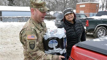 Obama signs emergency order over Flint water