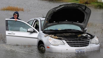 Sandy-damaged cars sit on lots, awaiting unwitting buyers