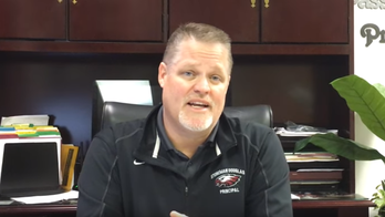 Principal of Florida school delivers emotional message promising to hug every student