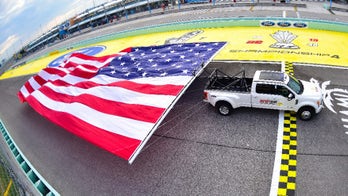Ford resets record for Largest Flag Pulled by a Moving Vehicle