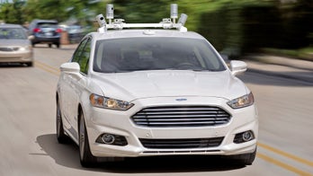 You'll be able to hitch a ride in a self-driving Ford in 2021