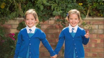 Formerly conjoined twins celebrate first day of school