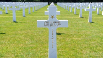 French and US volunteers tend to graves, honor lives of fallen WWII heroes