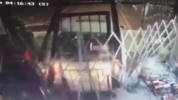 Stolen car smashes into store