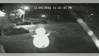 Grinch stabs home's inflatable Frosty as cameras roll