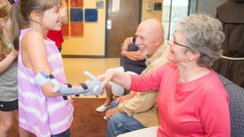 9-year-old receives 'Frozen'-themed prosthetic arm