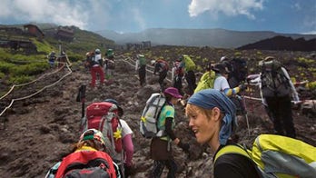 Hoards of hikers to Mt. Fuji are threatening holy mountain