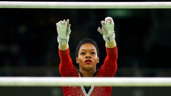 Gabby Douglas hospitalized, misses VMAs