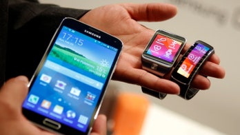Samsung Gear Fit is a stylish hybrid of smart watch and activity tracker