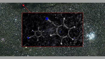 Discovery of organic molecules explains universe's infrared glow