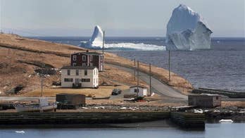 Town suddenly dwarfed by massive iceberg