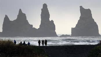 Iceland's tourism boom boosts economy, brings woes for locals