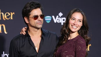 John Stamos' wife Caitlin McHugh hits back at body shamer trolling her bikini post