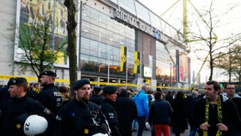 Champions League match postponed after explosions near Borussia Dortmund team bus leave one injured