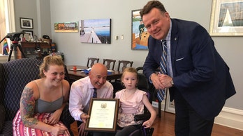 Non-verbal girl with cerebral palsy honored after saving baby brother's life
