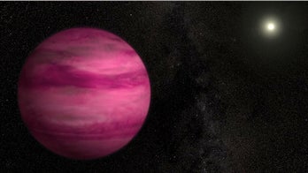 Pink alien planet is smallest yet photographed