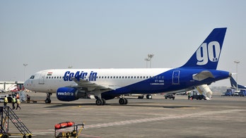 GoAir passenger and first-time flier tries to open emergency exit door thinking it was the bathroom