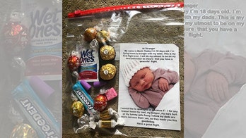 Dads traveling with new baby on plane hand out apology notes and goody bags