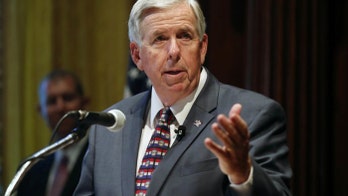 Governors of Missouri, Kansas sign deal to end economic ‘border war’