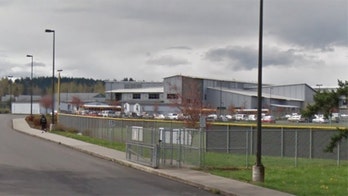 2 students shot near Washington high school, police say