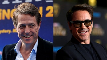Hugh Grant  reveals Robert Downey Jr. 'wanted to kill' him