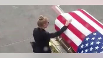 Military wife mourning fallen Green Beret in viral video is hailed as 'patriot'