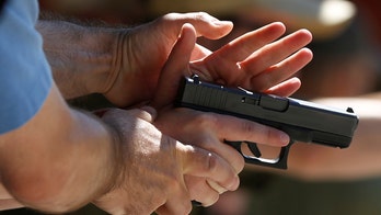 Uproar after New Jersey high school allegedly suspends students over gun-range photo