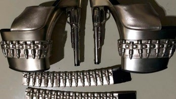 Gun-shaped heels land woman in hot water with TSA