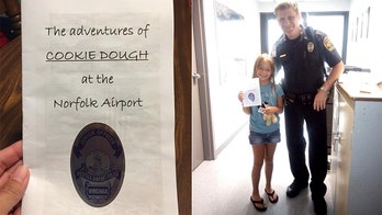 Norfolk airport police find girl's lost stuffed dog, take him on an adventure