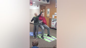 Middle school principal shaves head in solidarity with student supporting sick grandfather