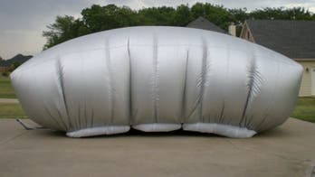 Inflatable car cover battles the elements