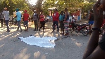 Bus fleeing fatal accident strikes crowd, kills at least 34